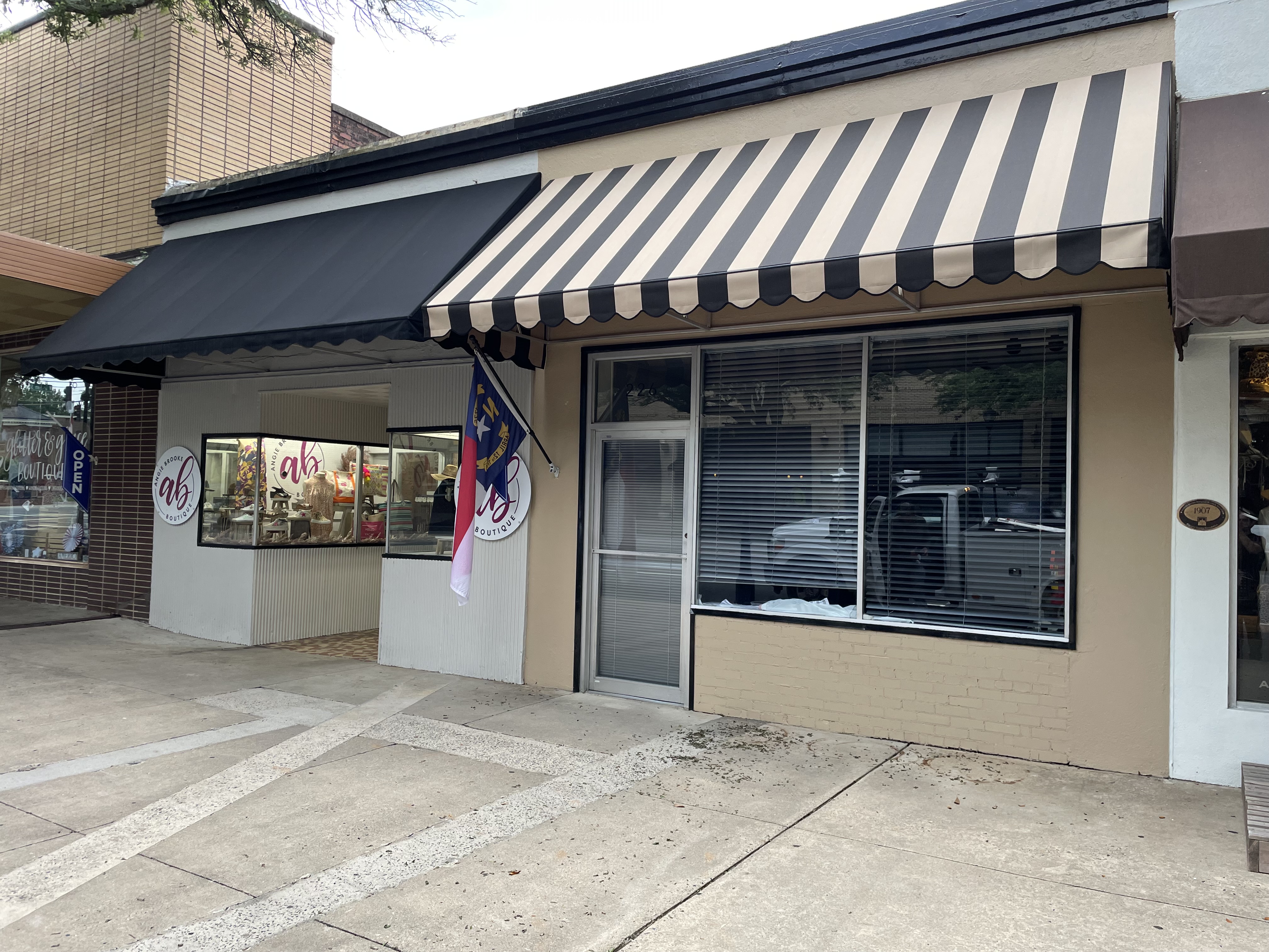 Storefront canvas wedge awning in Charlotte